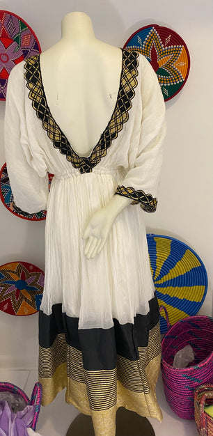 Black and gold Tilet Habesha dress