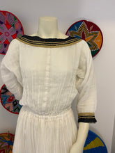 Load image into Gallery viewer, Traditional Habesha dress with black and gold Tilet
